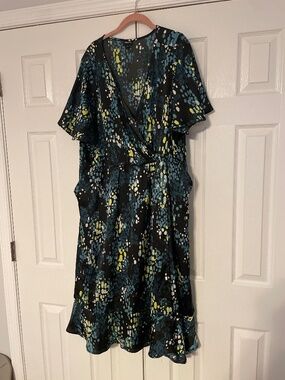 Faux wrap black with teal dot dress